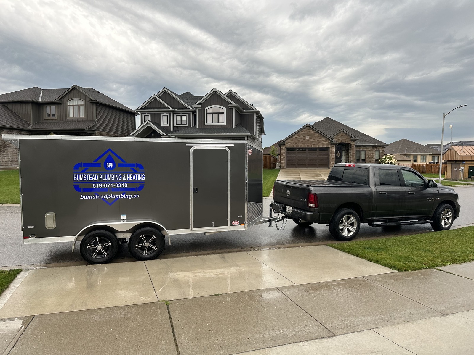 Bumstead Plumbing & Heating truck and trailer on a job in the Lucan area